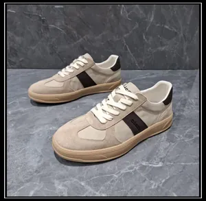 Side view of men's beige leather patchwork casual German Army Trainer sneakers
