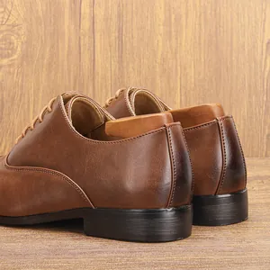 Close-up detail of the heel and stitching on classic brown leather business shoes