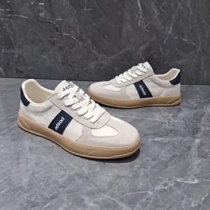 Men's leather German army trainer sneakers in beige with navy blue stripe details