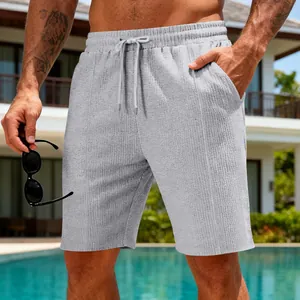Détail du tissu gaufré des shorts de sport décontractés pour hommes en gris chiné