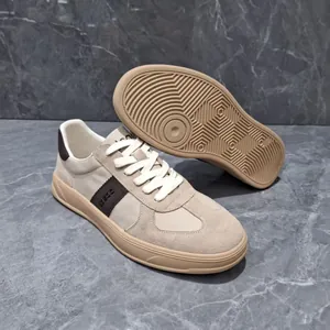 Men's casual leather sneakers with German army trainer style patchwork design