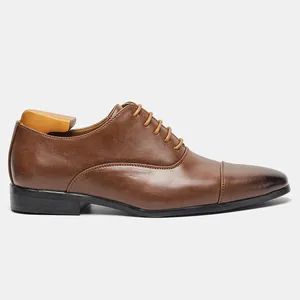 Professional side profile view of men's brown classic leather formal business Oxford shoes