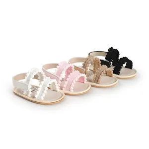 Set of soft-sole infant pre-walker sandals with cute pom-poms in white pink beige and black