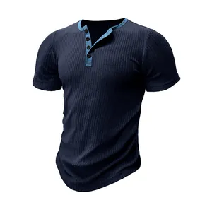 Detail of navy blue ribbed Henley shirt with light blue collar and button placket