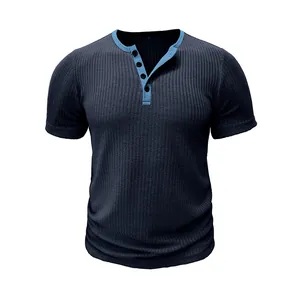 Detailed close-up view of a men's ribbed Henley T-shirt with blue color-blocked collar.