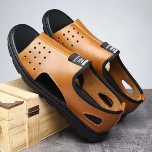 Detailed view of brown leather men's Roman sandals with breathable hollow design