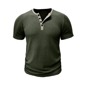 Close-up of men's dark green ribbed Henley shirt with contrast beige collar detail.