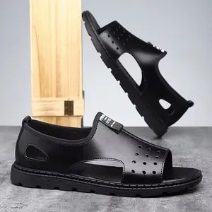 Close-up detail of breathable black Roman beach sandals for men featuring a cutout design