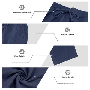 Dettagli dei pantaloni in lino blu navy da uomo: cintura, tasca e trama del tessuto.