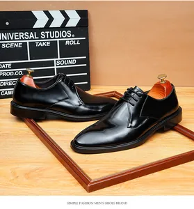 Classic black genuine leather men's business dress shoes with lace-up closure