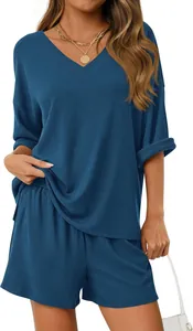 Elegante completo 2 pezzi donna scollo a V in maglia a coste per estate e mare blu