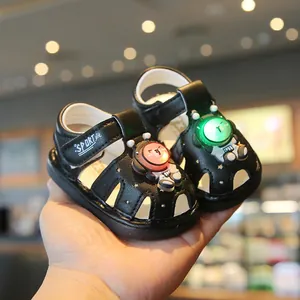 Black baby light-up sandals with cute astronaut bear character for toddler walkers
