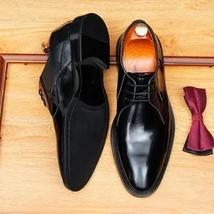Elegant black shiny leather business dress shoes for men in a classic vintage style