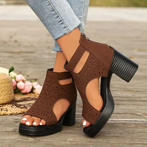 Stylish brown cutout peep toe chunky heel sandals on a model