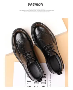 Chaussures de ville noires pour hommes avec détails en cuir perforé élégants et raffinés.
