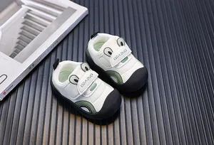 Premium toddler walking shoes featuring breathable mesh and a cute ear design detail