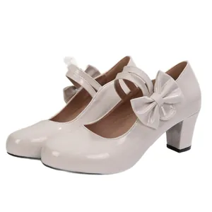 Escarpins Mary Jane élégants en cuir verni beige avec nœud et talons épais
