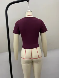 Detailed back view of a burgundy short sleeve slim fit crop top on a professional mannequin