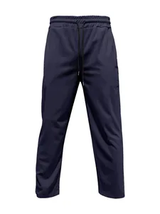 Detailed close-up view of navy blue men's corduroy trousers featuring a drawstring waist