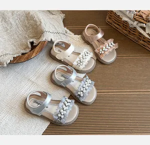 Summer children's open-toe sandals featuring pearl flowers and ruffles in four colors.