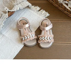 Elegant pink girls' princess sandals featuring exquisite pearl flower and lace details