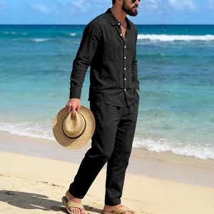 Full body view of men's black linen shirt and pants set for casual beach style