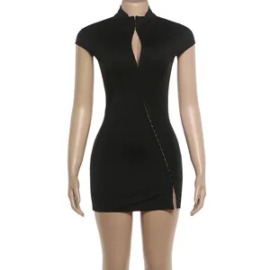 Detail view of black bodycon mini dress with diagonal hook-and-eye closure and high collar