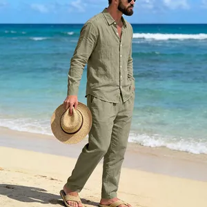Casual men's linen beach set featuring olive green shirt and pants on sunny beach