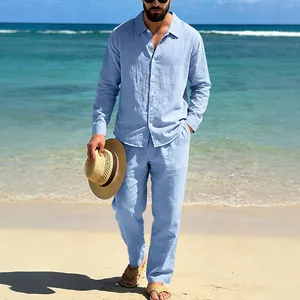 Casual light blue men's linen set with long sleeve shirt and straight pants for beach.