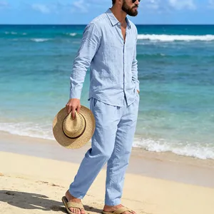 Lifestyle view showing the texture and fit of the men's light blue linen beach set