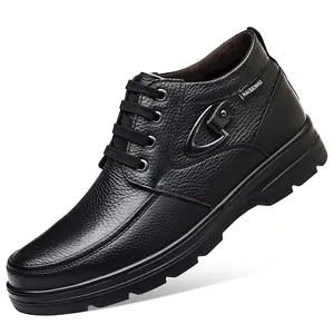 Detailed side view of black genuine leather men's high-top casual snow boots