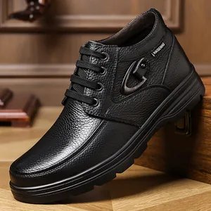 Side profile of premium black leather high-top men's shoes with side metal buckle