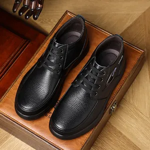 Detailed close-up of high-quality black genuine leather men's casual shoes with lace-up