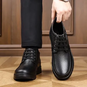 Close-up detail of premium black litchi grain leather men's casual high-top shoes