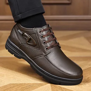 Detailed close-up of brown grain leather men's high-top casual boot with laces