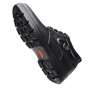 Detailed view of non-slip rubber sole and leather texture of men's casual boots