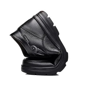 Detailed view of flexible black litchi grain leather men's shoe showing sole bendability