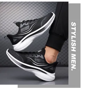 Detailed view of breathable black mesh men's running shoes with white soft sole.