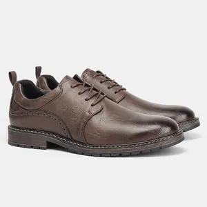 Professional close-up of men's brown textured leather oxford shoes with classic lace-up design