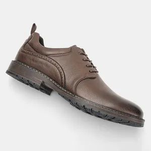 Side view detail showing the texture of brown men's burnished leather dress shoe laces