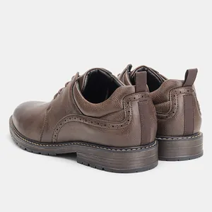 Rear view of brown men's dress shoes featuring stylish brogue perforation details
