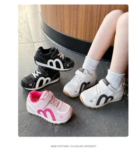 Detail view showing pink, white, and black breathable mesh sneakers for children.