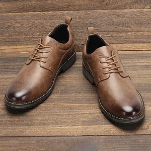 Macro detail of men's brown rub-off leather casual Oxford shoes on a rustic wood background