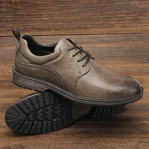 Detailed view of brown textured leather men's casual shoes with rugged lug sole