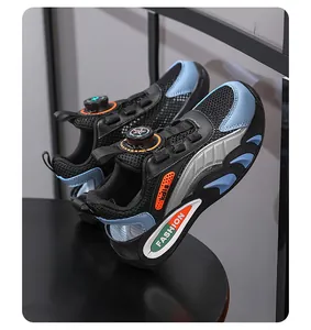 Close-up view of black and blue children's mesh sports shoes with a rotary buckle.