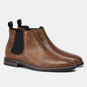 Vue détaillée des bottines Chelsea marron vintage pour hommes et texture du cuir