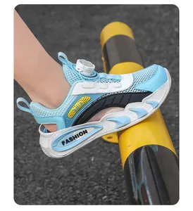 Detailed side view of breathable blue mesh children's sports sandals with a rotary buckle.