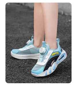 Detailed side view of children's mesh sneakers featuring a rotary dial lacing system