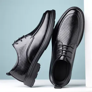 Zapatos de vestir negros perforados para hombre, elegantes y transpirables.