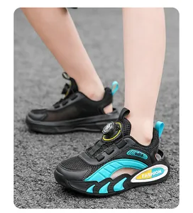 Breathable mesh children's sports shoes with vibrant teal accents and rotary dial laces